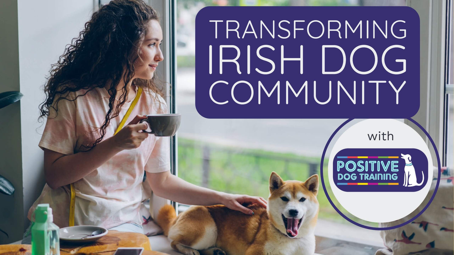 A woman sitting in a window with her dog and drinking coffee and a box with text “Transforming Irish Dog Community”