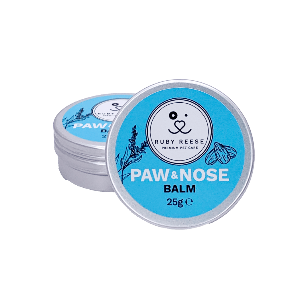 Small flat aluminium RUBY REESE PAW & NOSE BALM tin with a light blue label on top of the lid